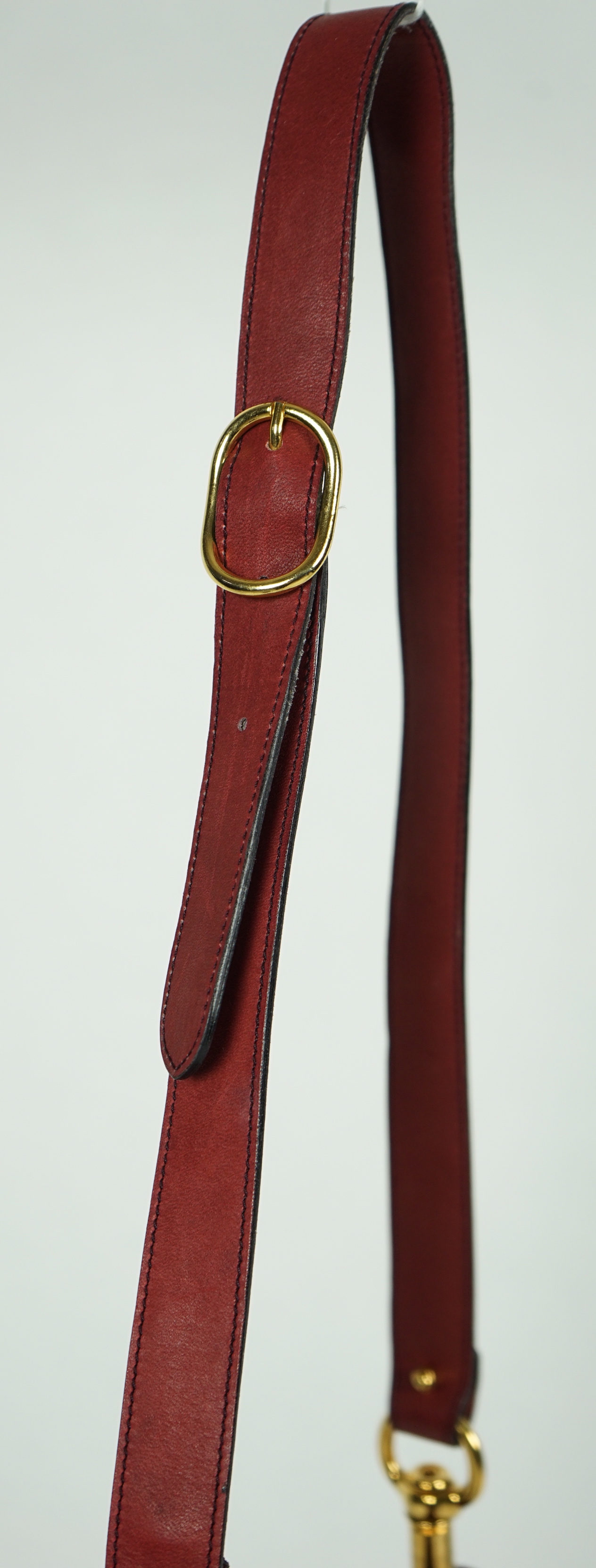 A vintage Gucci Blondie claret suede shoulder bag, width 29.5cm, max height 25cm, overall height 63cm to top buckle hole